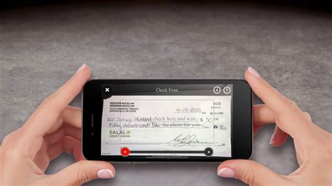 Visit your bank. . How to mobile deposit a fake check